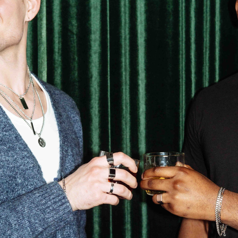 Sterling silver Figaro Chain 5mm styled with layered jewelry