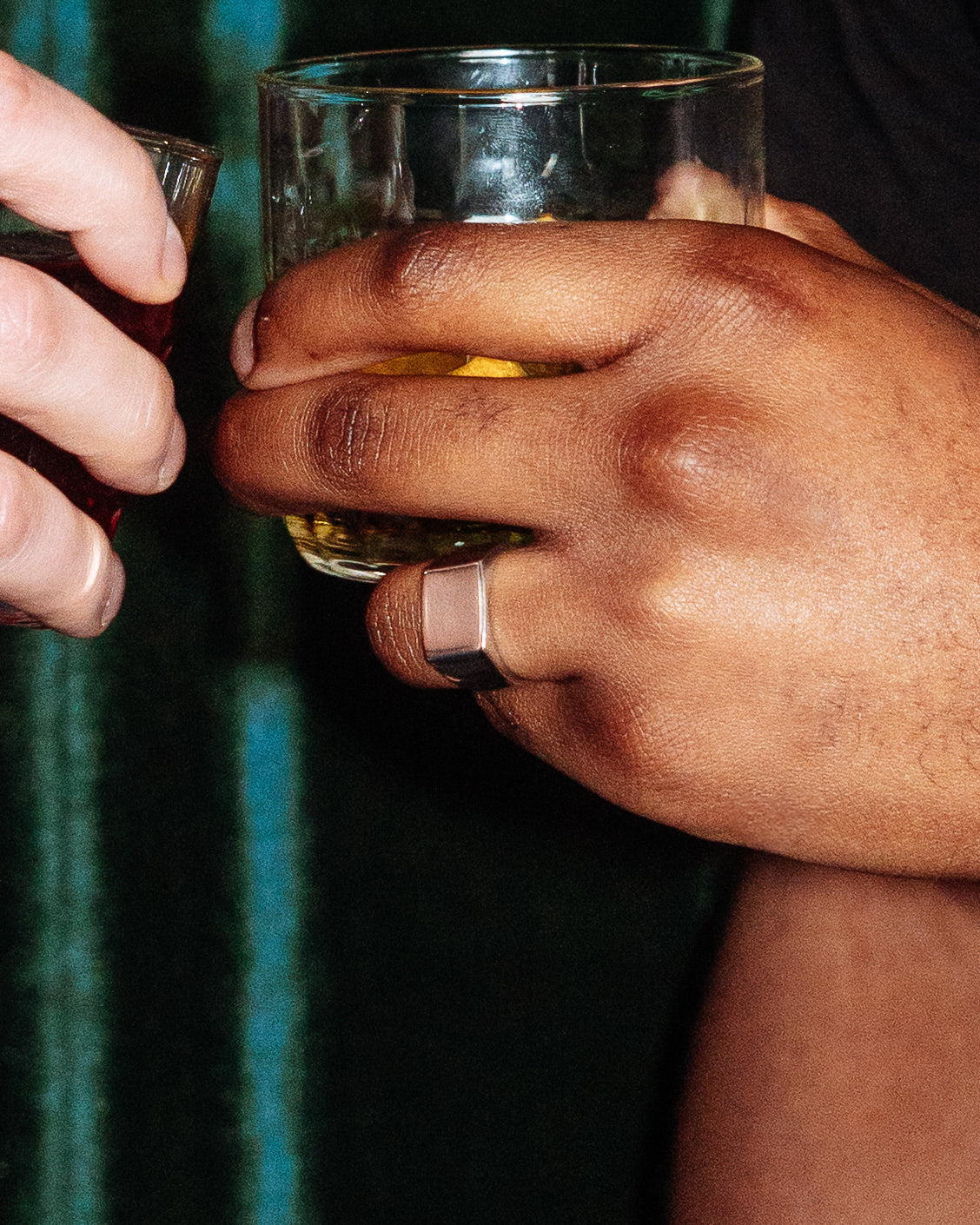Plain Signet Ring - stacked with Crown Signet Ring, Onyx Signet Ring and Hammered Band Ring, two hands toasting with cocktails