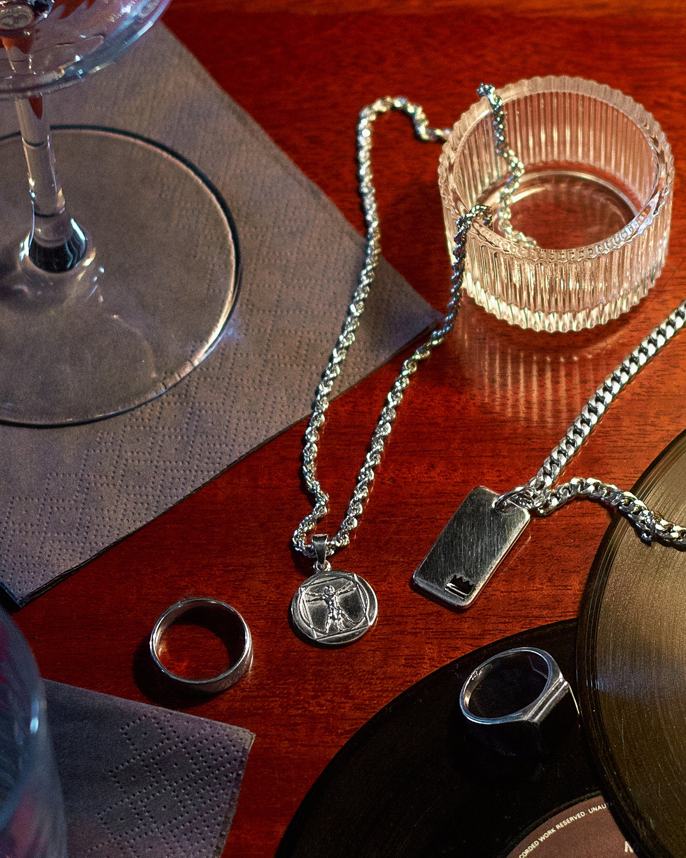 Rope Chain 3mm - styled with Crown Dog Tag, Cuban Chain 5mm, Onyx Signet Ring and Rope Chain 3mm, tabletop arrangement of pendants, chain and ring
