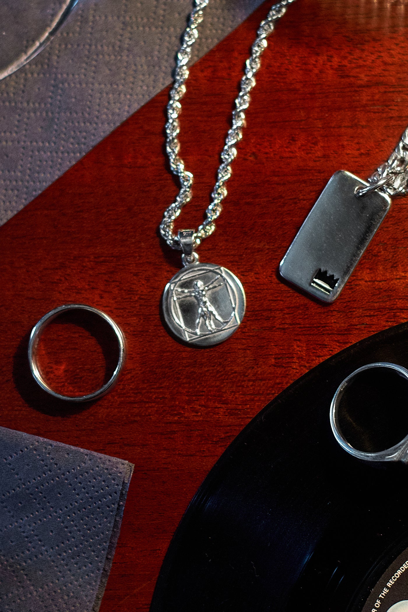 Vitruvian Pendant - styled with Crown Dog Tag, Plain Signet Ring and Rope Chain 3mm, tabletop arrangement