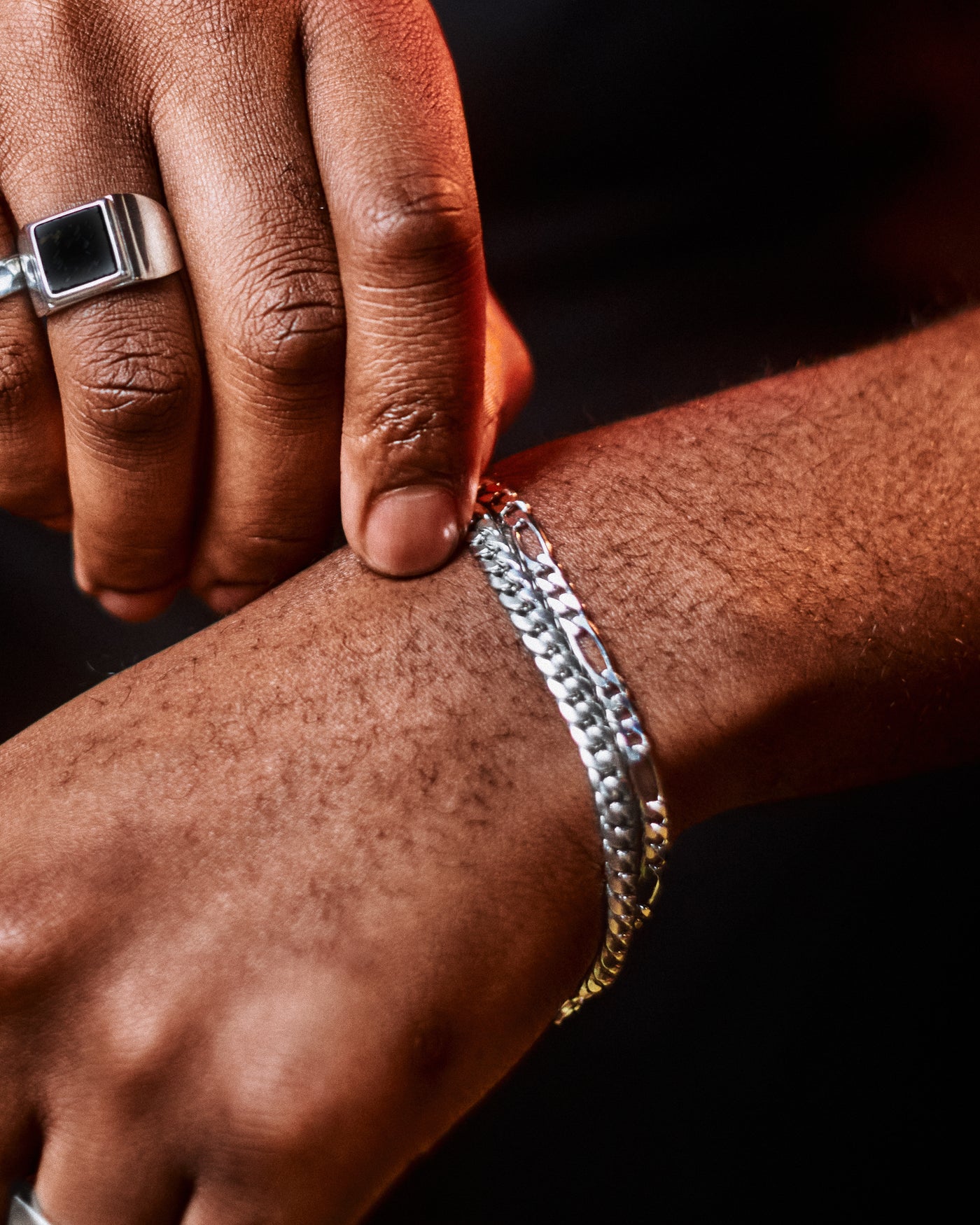 Figaro Bracelet 5mm - styled with Onyx Signet Ring, Hammered Band Ring and Cuban Bracelet 5mm, close-up of hand